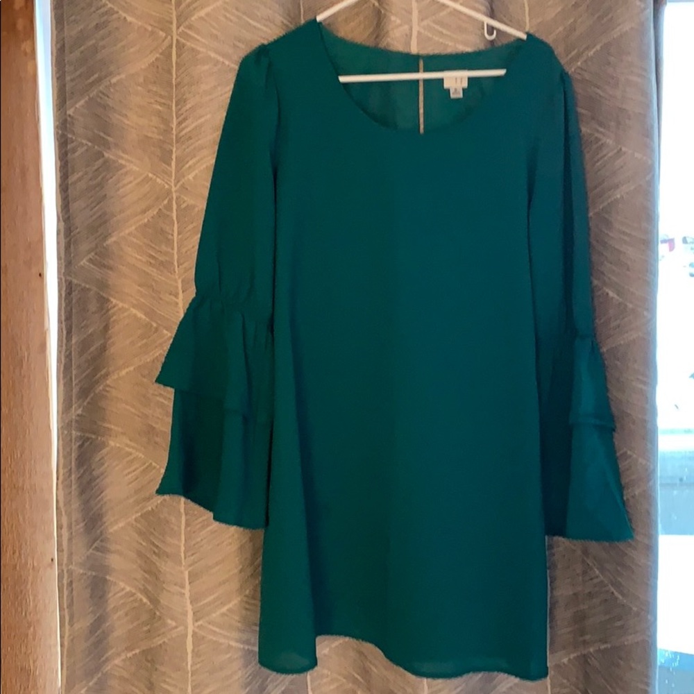 Green shift dress with ruffle sleeves